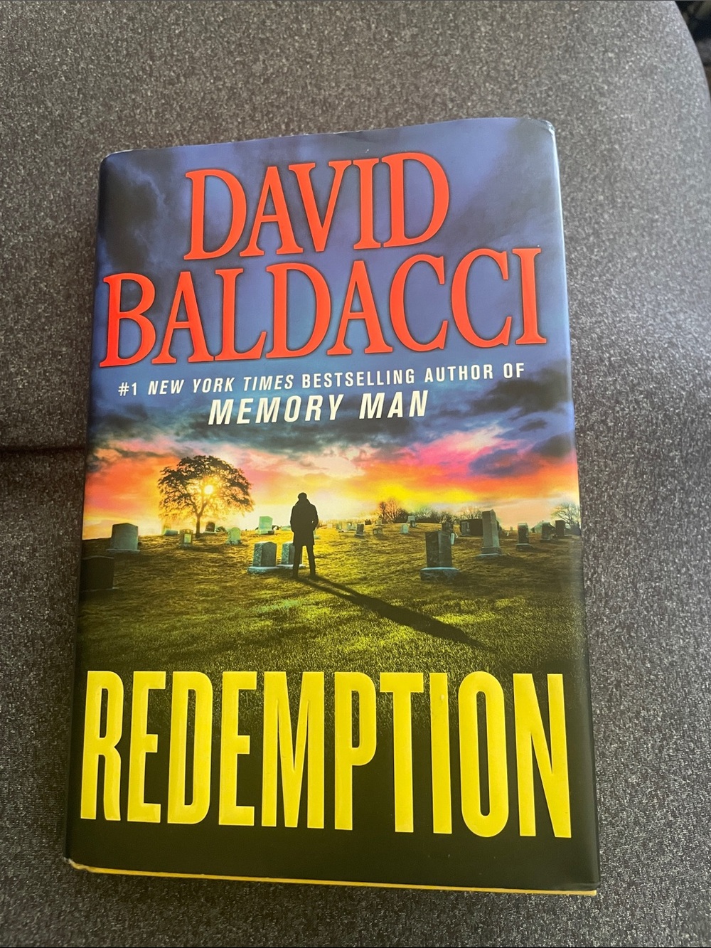 David Baldacci "Redemption" Hardcover Book - Yellow & Orange Cover